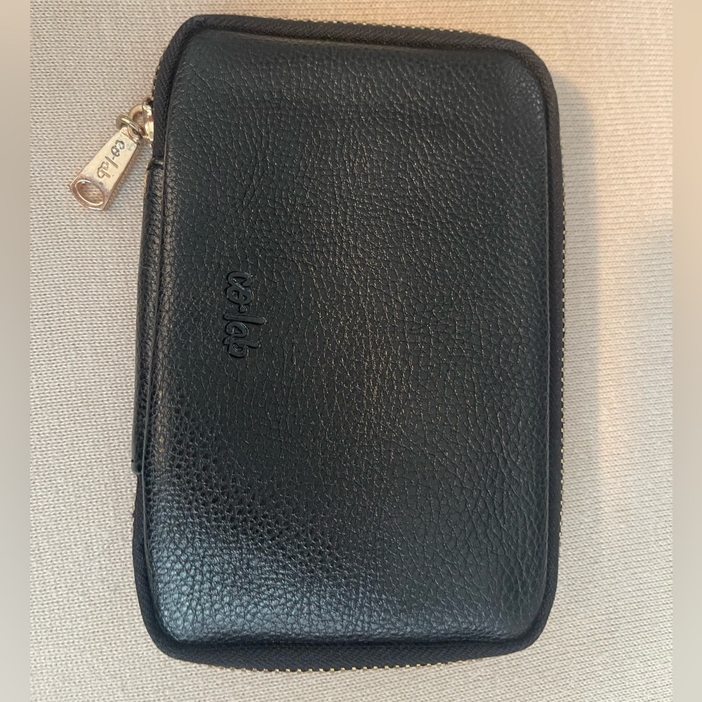 3/$20 Good used condition black wallet.
